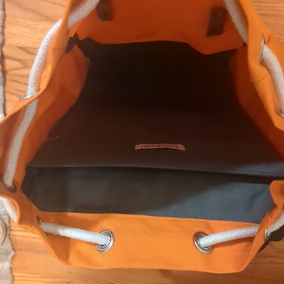 Sandqvist orange canvas backpack w leather buckles